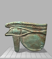 By rotating the eye, you can see that it is holed at both ends, so could have been worn around the neck as a protective amulet. Both sides are detailed; these have been moulded, rather than painted.