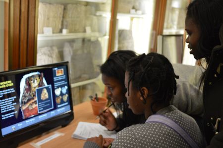 Young visitors using the Modern Makeover app
