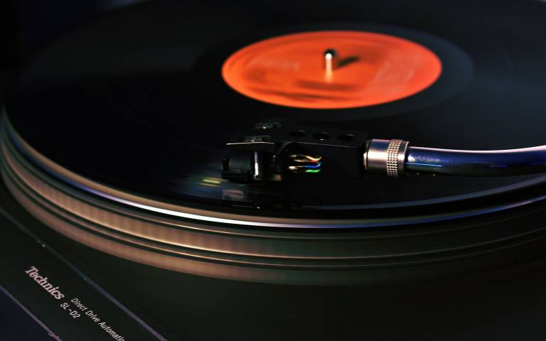 Image of record on a turntable.