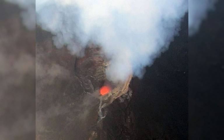 Aerial view of the active vent and gas plume of Manam volcano, Papua New Guinea