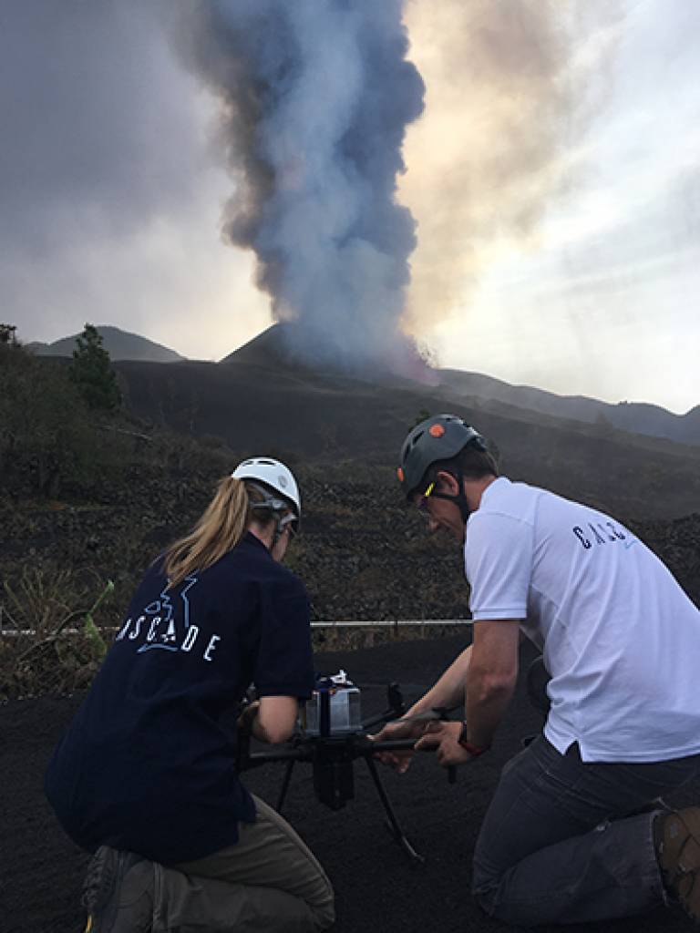 Preparing the drone and aerial MultiGAS system to acquire in-situ chemical measurements within the volcanic gas plume. 