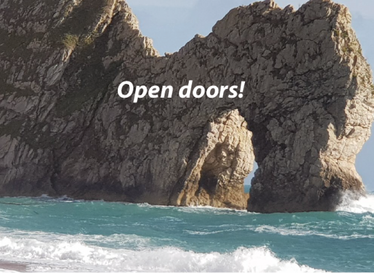 rock arch with open doors text