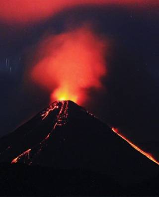 Reventador volcano, Ecuador showing simultaneous effusive and explosive activity.