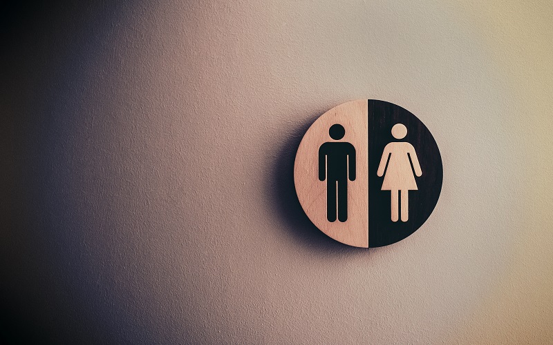 door sign with male and female gender signs