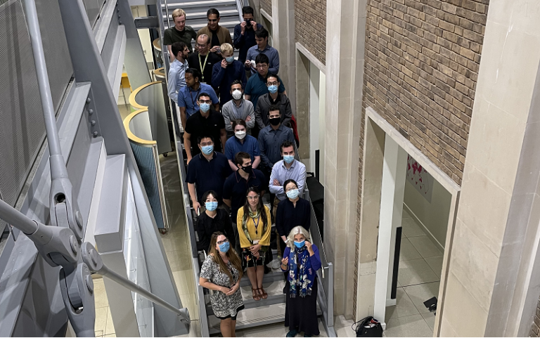 Group photo of the Optical Networks research team taken on a staircase