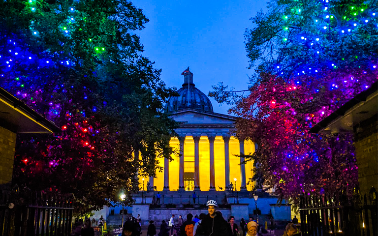 UCL Portico lit up at night