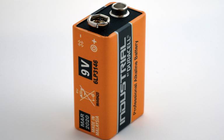 A large orange battery