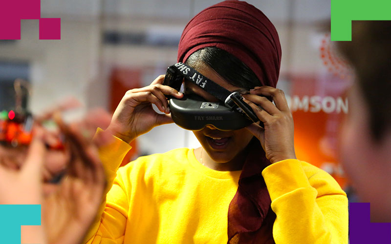 Image of student with a VR headset on