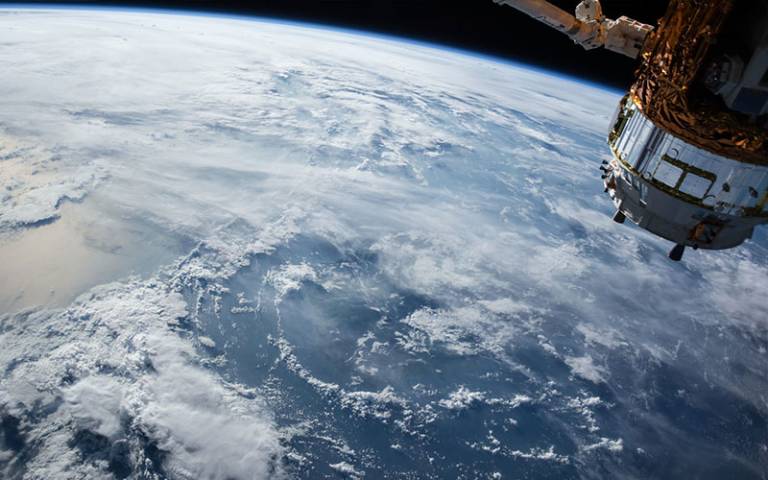 A satellite over Earth - photo from Pixabay 