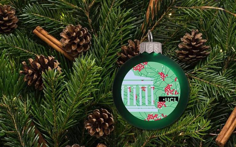 A Christmas bauble with the UCL logo on it