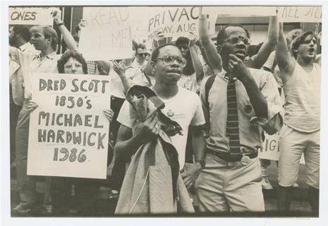 Photograph by Donna Binder.  Angel and Robinson in New York City in the summer of 1986 protesting the United States Supreme Court decision in the case of Bowers v. Hardwick that upheld the constitutionality of a Georgia sodomy law.