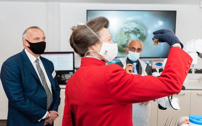 Her Royal Highness (centre) inspects the EDI Rockefeller facilities with Provost Michael Spence (left)