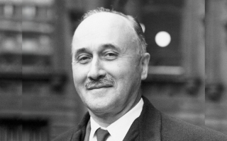 a profile image of Jean Monnet in black and white