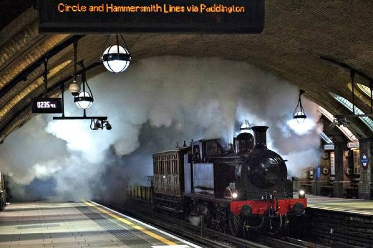 steam train pulling into Baker Street Station
