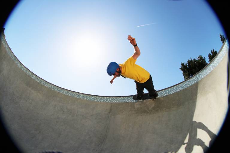image of a young person skateboarding