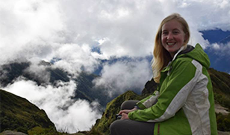 Emily Smith, PhD student at UCL Geography, on a mountain.