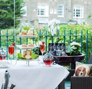 Outdoors image of afternoon tea in Montague Gardens hotel