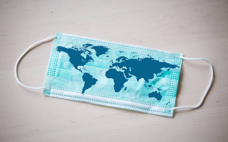 World map printed on a face mask