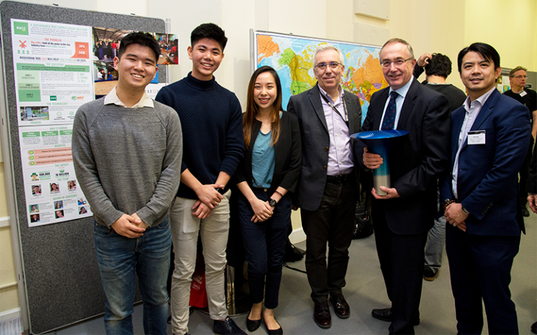 UCL student winners of the Hult Prize with UCL Provost Prof Michael Arthur