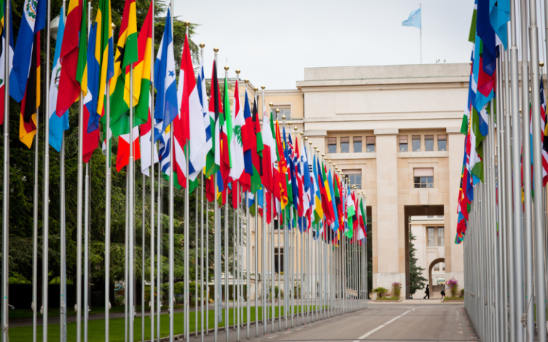 A view of the flags outside of the Palais des Nations in Geneva.