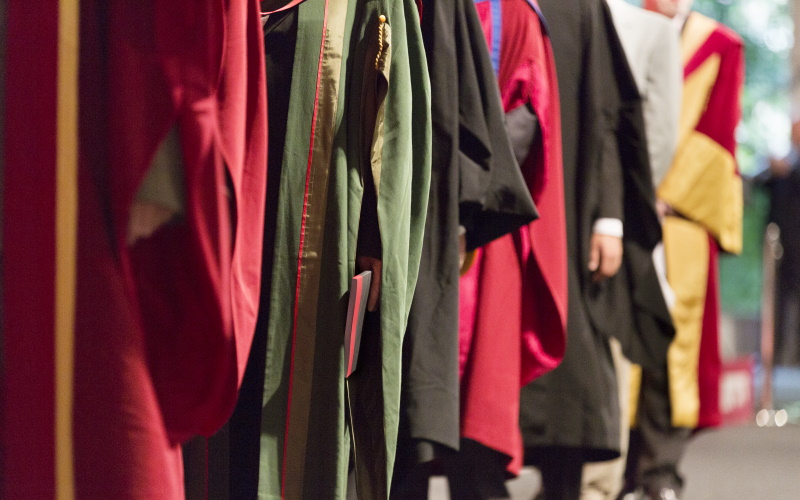 graduation robes in a line
