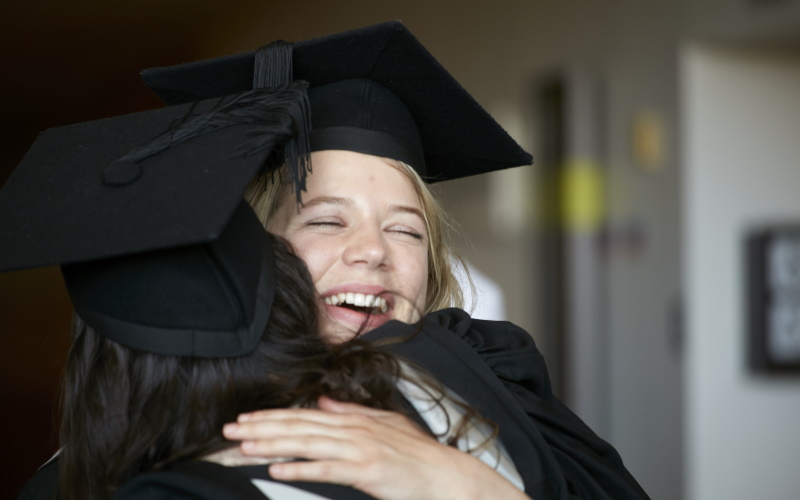 UCL graduates hugging