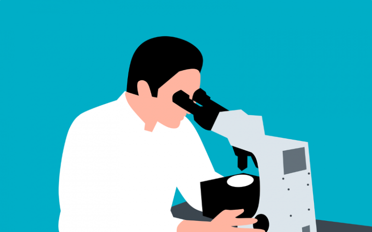 Scientist with a microscope