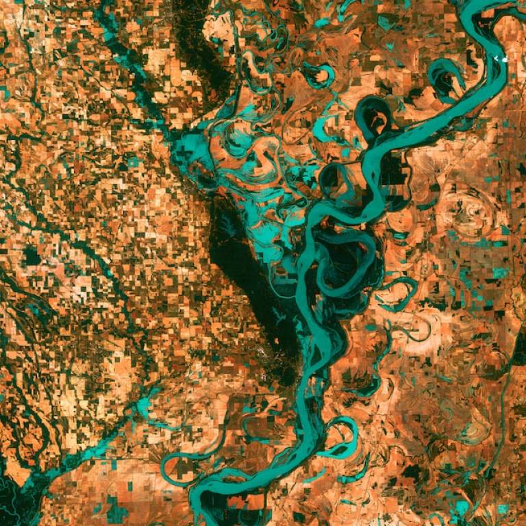Aerial image of river and housing in USA.