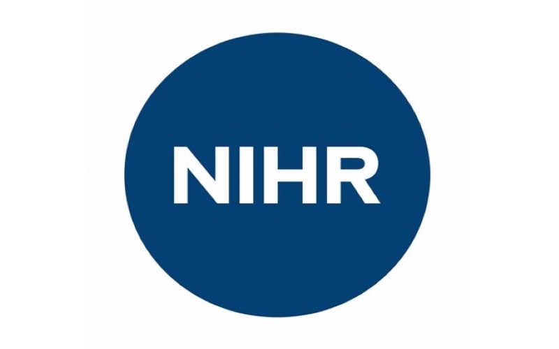 Blue circle with the letters NIHR written in it on a white background.
