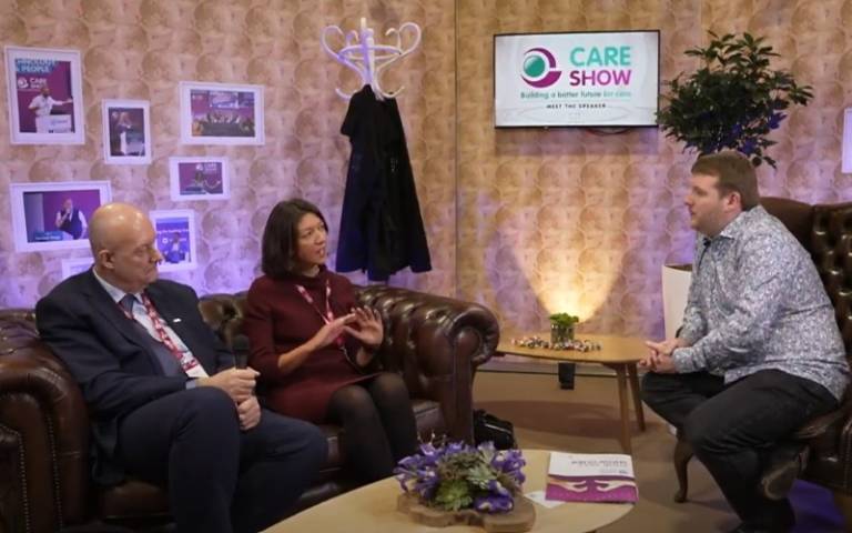 Laura Shallcross sitting on a sofa for The Care Show interview with two others