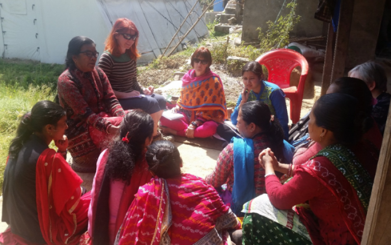 Researchers and a group of Nepalese women