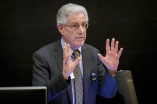 Prof David Ruderman gesturing while speaking to audience
