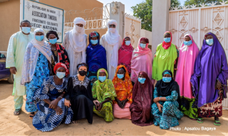 Members of the LESLAN team and grassroots consultants for the gender and wahayou activity pose for a group picture outside Timidria's headquarters in Niamey
