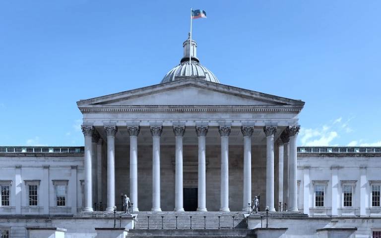 UCL Portico building on a bright day with a blue sky
