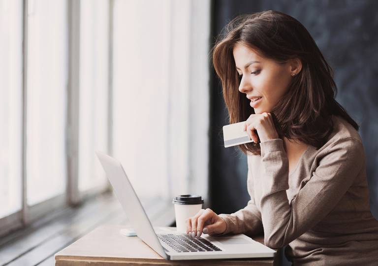 Woman thinking about financial benefits
