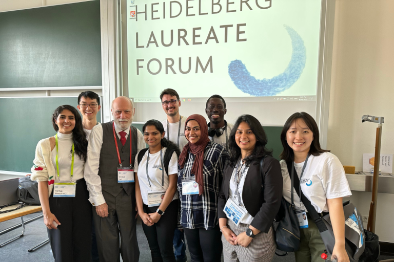 Picture of Martin Ferianc with Vint Cerf and other young researchers at HLF 2023