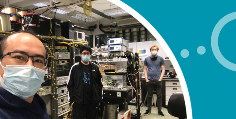 Zhixin Liu and two researchers in the ONG lab wearing PPE face masks