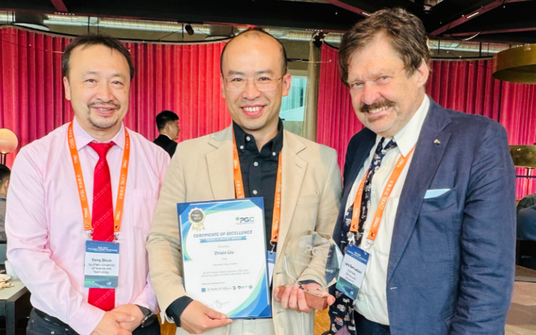 Zhixin Liu receiving award at PGC