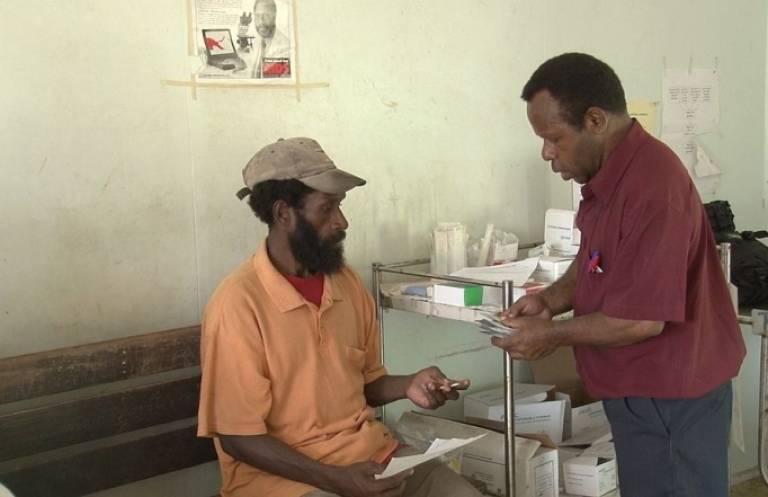 A TB patient is given daily treatment at the Mabuduan Health Centre, Papua New Guinea. Image courtesy AusAID, used under CCA2.0 license