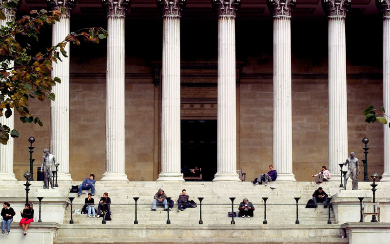 Image showing students sitting on steps of UCL's Main Building