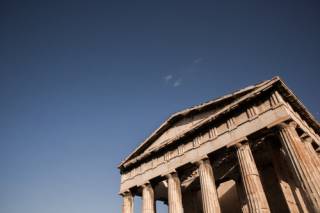 Ancient Greek agora with bright blue sky behind