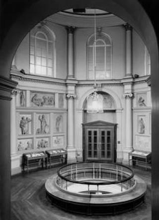 black and white interior photo of UCL's main library