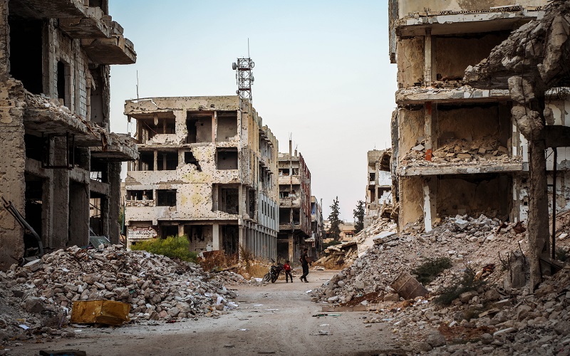 photo of ruined buildings in war-torn Syria