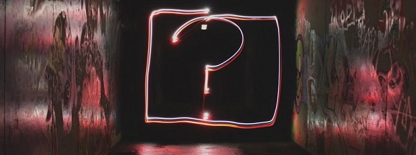 neon light in a question mark shape