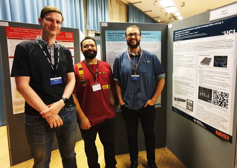 Photo of three people at the BioMedEng conference