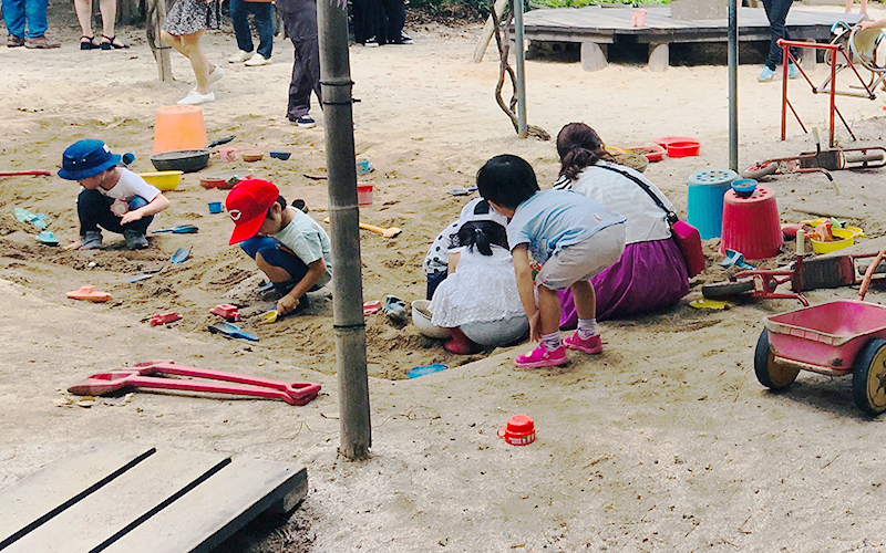Children playing in a sandpit. (Photo by Dr Kate Cowan)