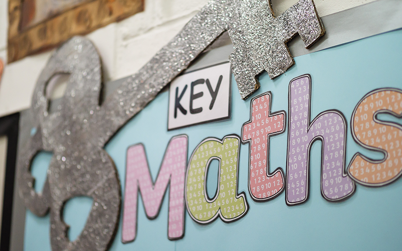 Maths and key on a classroom board. Credit: Phil Meech for UCL IOE.