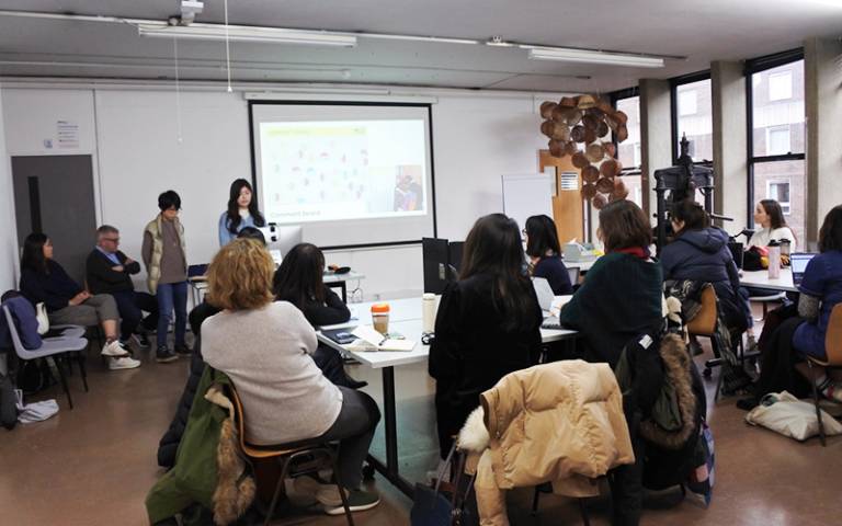 Students listening to a presentation. Image credit: Kanae Minowa.