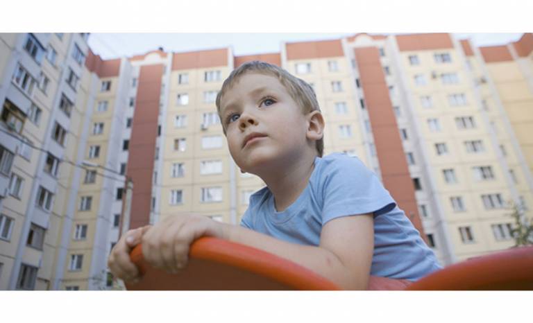 Child by Block of Flats