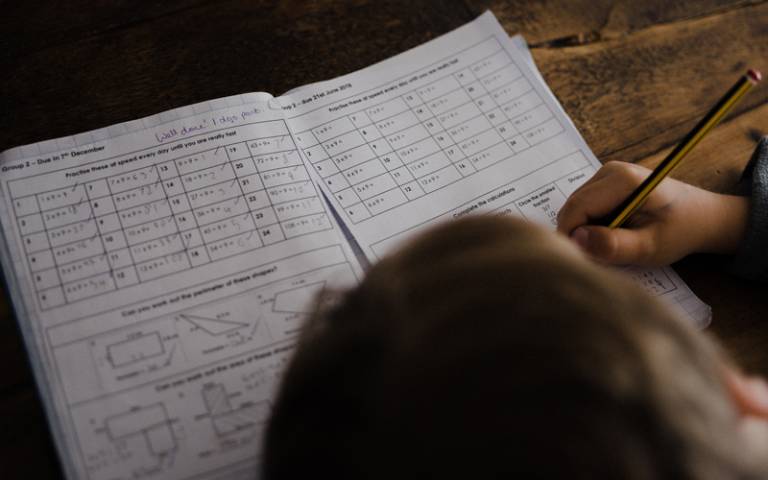 Child doing maths work. Image: Annie Spratt via Unsplash